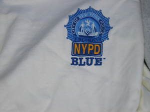 NYPD BLUE TEE SHIRT CHARLOTTE ROSS JIMMY SMITS KIM DELANEY DENNIS 