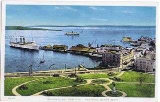 Postcard 935699 Mackinac Bay City Island MI Ships Boats Monument