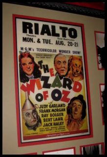 26 year repro old poster large display center smaller display left