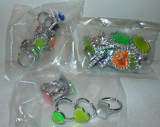 Lot of 25 toy rings from the Collegeville Costumes warerhouse. About 7