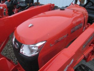 4x4 Compact Tractor with LA524 Loader Attachment 108 Hours