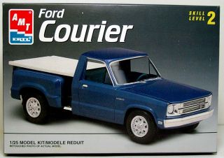 this auction includes an amt ertl ford courier pickup truck 1 25 scale