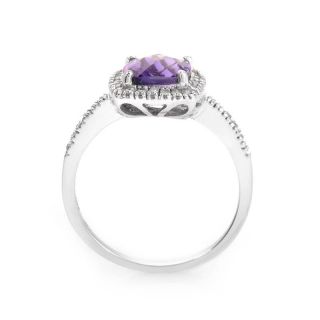  cut amethyst. Lastly, the bezel and shanks are set with ~.15ct of
