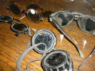  pair of old eye glasses     aviator ? three pair from old doctors desk