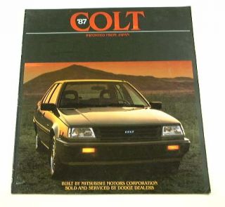 Original 1987 Dodge Colt Brochure. Covers the E, DL, 3 door, 4 door