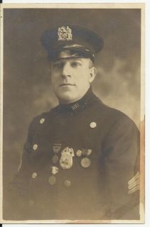 Early 1900 New York Police Officer with Badge and Cap