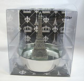 very unique eiffel tower statue jewelry tray it features silver tone