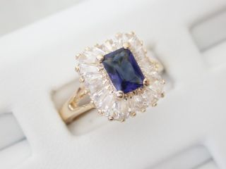Emerald Cut Sapphire Cubic Zirconia Ring with Baguettes