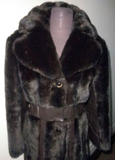 This yummy Jet Set faur Mink and leather coat is lined in luscious