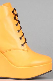 Ego and Greed The Poland Boot in Neon Orange