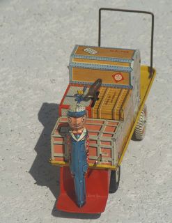 Finnegans Baggage Cart Tin Windup Toy    by Unique Art Manufacturing