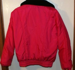 This is a really nice, reversible womens size medium snow ski jacket