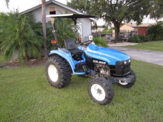   Holland TC 33 Diesel Compact Tractor 4 Wheel Drive R3 Tires 558 Hrs