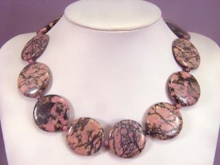  necklace is made from 12 pieces of rhodonite gemstones the stones are