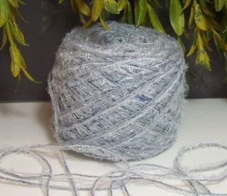 Delicate and feminine, The grays in this yarn also have a hint of dark