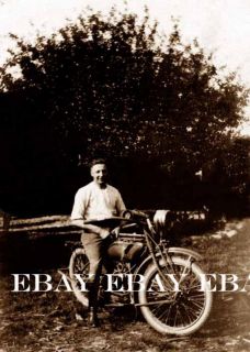 The Old Motorcycle Rider on His Vintage Bike Photo