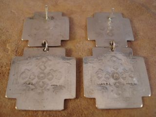  silver santa fe cross earrings are marked harold j harold joe navajo