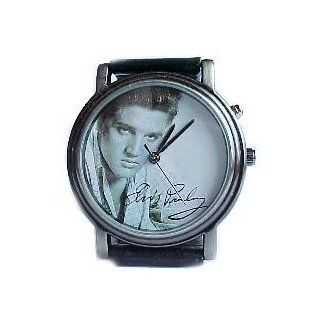 ELVIS Musical watch.Mans size Plays Cant Help Loving You.5054