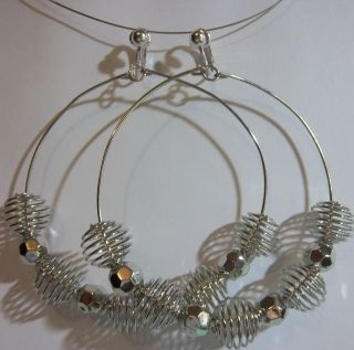 Clip on 3 5 Silver Tone Wire Coil Metallic Hoop Earrings C692