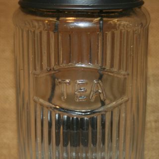 This is a tea light candle tart warmer in a Hoosier Tea jar.