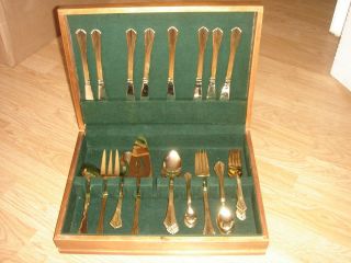 International Gold plated Stainless Steel 52 pc. set of eight Flatware