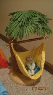 Jesss Tree Swinging Chair has a woven Maya throw blanket .