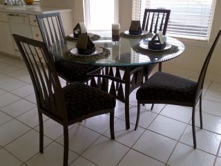 Kitchen Table Set   Round Glass Table with bronze metal base and 4