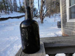 Very Dark Amber Saratoga Springs Quart Bottle with Married Neck