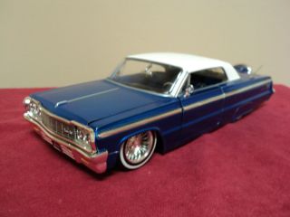 1964 Chevy Impala w continental kit no longer made 1 24 scale lowrider