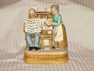 Vintage Porcelain Figurine of an Old Couple with music box
