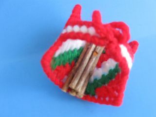 Hand crafted needlepoint Christmas Tree ornament basket of logs