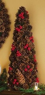artificial christmas tree with pine cones