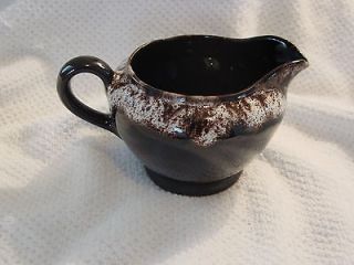 Royal Canadian Art Pottery creamer, deep brown, drip pattern, 3.25