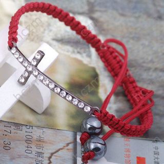 gunmetal tone sideways cross bracelet dark red cord braided karma