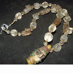 Crystal used preowned Afghan Stone beads Necklace With Glass Face