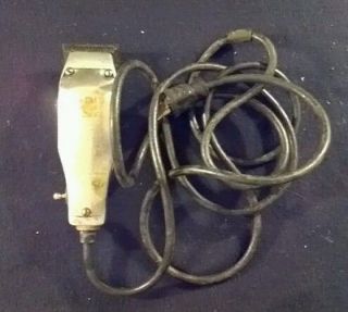 Antique 1930s Andis Junior De Luxe hair clippers toggle on/off switch