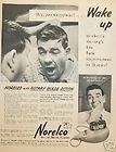 1955 Norelco Rotary Electric Shavers Men Pajamas Ad