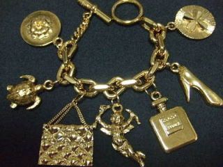 listed Authentic Chanel Vintage Gold Chain W/ 7 Charms Bracelet coco