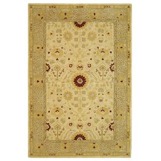 Handmade Timeless Ivory/ Sand Wool Rug (6 X 9) (GrayPattern OrientalMeasures 0.625 inch thickTip We recommend the use of a non skid pad to keep the rug in place on smooth surfaces.All rug sizes are approximate. Due to the difference of monitor colors, s
