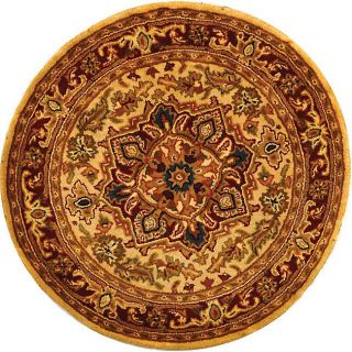 Handmade Classic Heriz Gold/ Red Wool Rug (8 Round) (GoldPattern OrientalMeasures 0.625 inch thickTip We recommend the use of a non skid pad to keep the rug in place on smooth surfaces.All rug sizes are approximate. Due to the difference of monitor colo