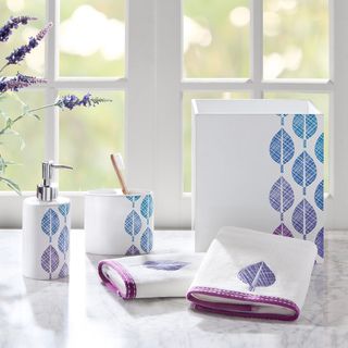 Madison Park Central Park Bath Accessory 5 piece Set (Blue/purpleLotion/toothbrush holder materials DolomiteWastebasket materials WoodHand towel 100 percent cottonDimensions Lotion/soap dispenser 7.25 inches high x 3 inches wide x 3 inches longToothb