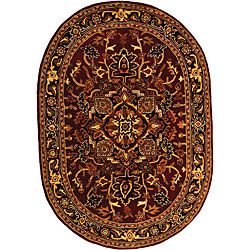 Handmade Classic Heriz Red/ Navy Wool Rug (46 X 66) (RedPattern OrientalMeasures 0.625 inch thickTip We recommend the use of a non skid pad to keep the rug in place on smooth surfaces.All rug sizes are approximate. Due to the difference of monitor color