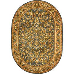 Handmade Exquisite Blue/ Gold Wool Rug (76 X 96 Oval) (BluePattern OrientalMeasures 0.625 inch thickTip We recommend the use of a non skid pad to keep the rug in place on smooth surfaces.All rug sizes are approximate. Due to the difference of monitor co
