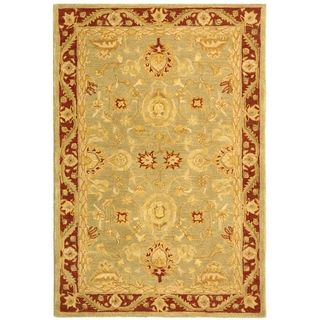 Handmade Kashan Green/ Red Wool Rug (4 X 6) (GreenPattern OrientalMeasures 0.625 inch thickTip We recommend the use of a non skid pad to keep the rug in place on smooth surfaces.All rug sizes are approximate. Due to the difference of monitor colors, som